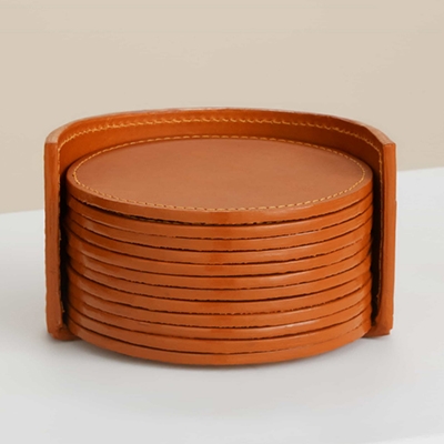 The Vendeur Sustainable Christmas Gift Guide For The Host Leather Coaster Set Paradise Row